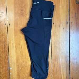 Athleta Black Capri Leggings with Subtle Logo, Pocket, Zip & Back Pocket